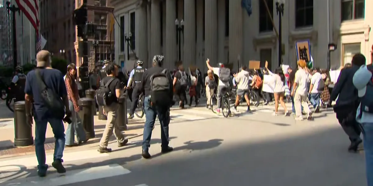 Chaos in Chicago: Immigration Protests Cause Major Street Closures, Vehicle Nears Protesters