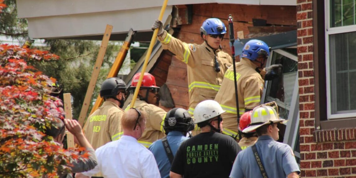 Dump Truck Crashes into Home in Local Neighborhood, Firefighters Quickly Respond