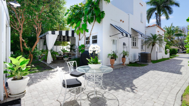Mediterranean Revival Redefined: Stunning 1925 Home with Chic Interiors and Lush Outdoors